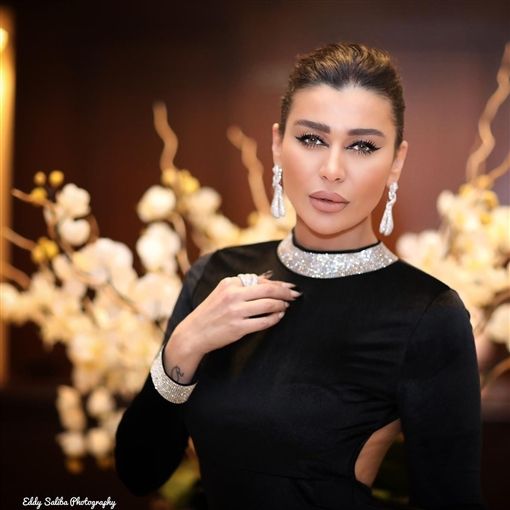 نادين الراسي عن مشكلتها مع شقيقها: 'رضعته 9 شهور مع ابني!'