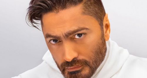تامر حسني يشوق الجمهور لهرمون السعادة