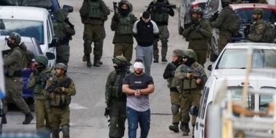 الاحتلال يعتقل 14 فلسطينياً من الضفة