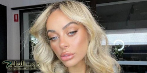 إميلي ديفيز في جلسة تصوير مرتجلة للأزياء .. وسعر فستانها زهيد