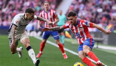 أتلتيكو مدريد يهزم أوساسونا ويتصدر الليغا