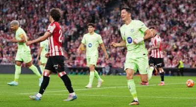 برشلونة ينهي الليغا بثلاثية في بلباو