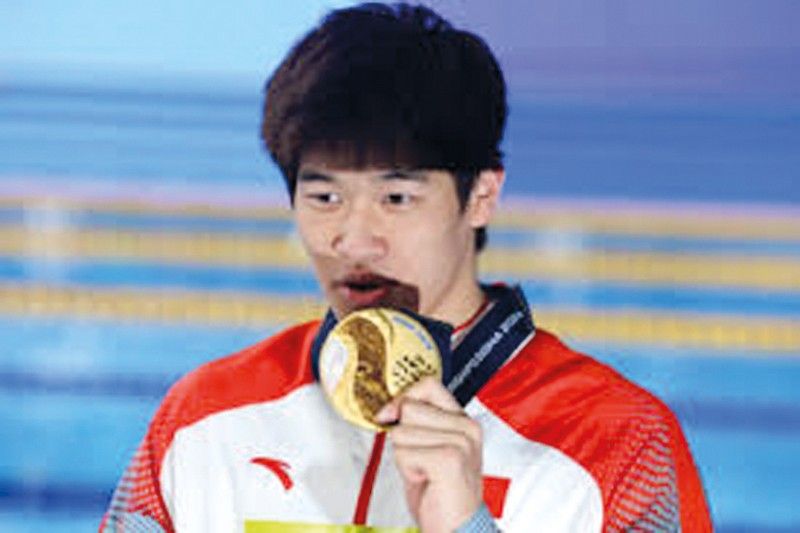 إقصاء مفاجئ للصيني زانلي من سباق 200 م حرة