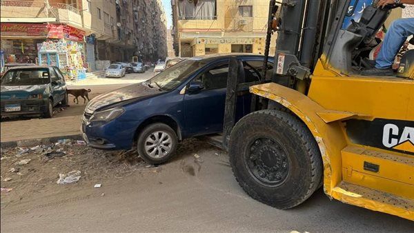 محافظة الجيزة: رفع السيارات المتهالكة وحملة نظافة مكبرة أسفل محور عمرو بن العاص "المطبعة فيصل" والأربعين