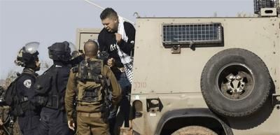 الاحتلال يعتقل 20 فلسطينياً من الضفة