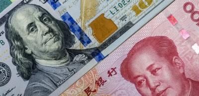 اليوان عند ذروة 3 سنوات مقابل الدولار
