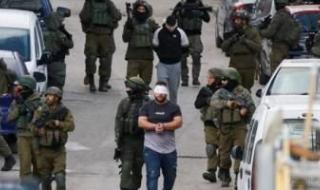 الاحتلال يعتقل 14 فلسطينياً من الضفة